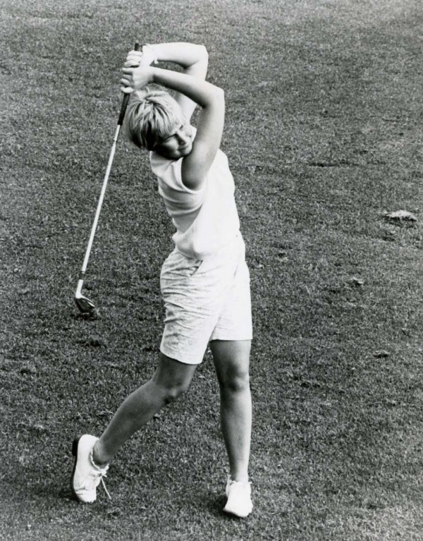 photograph of Sandra Post swinging golf club