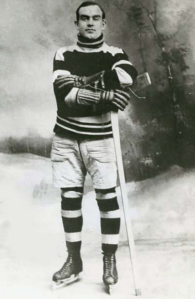 photograph of Fred Taylor in hockey uniform