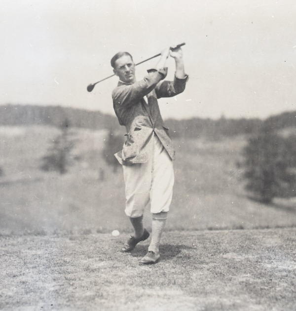 photograph of Albert Murray swinging golf club