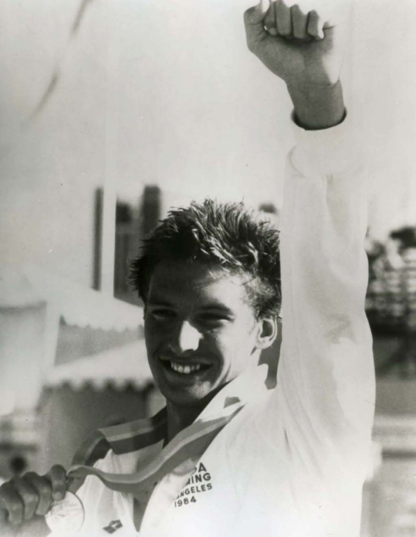 photograph of Alex Baumann holding gold medal