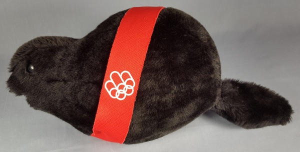 black toy beaver with red band