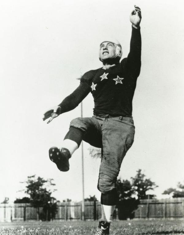 photograph of Hugh Stirling kicking football
