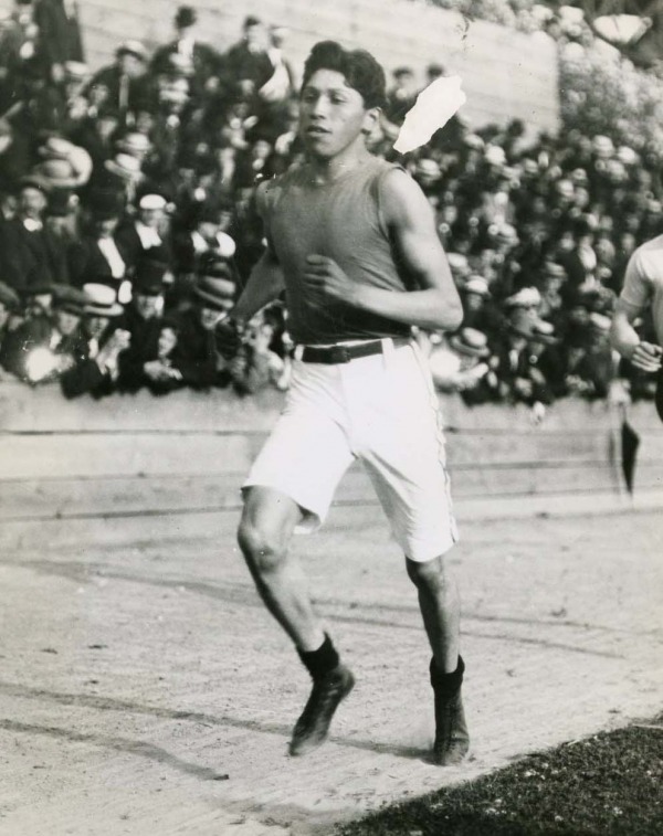 photograph of Tom Longboat running in race
