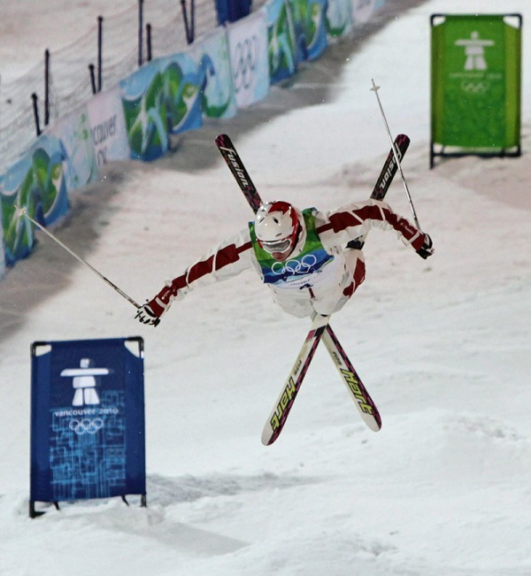 photograph of Alexandre Bilodeau doing jump in moguls competition