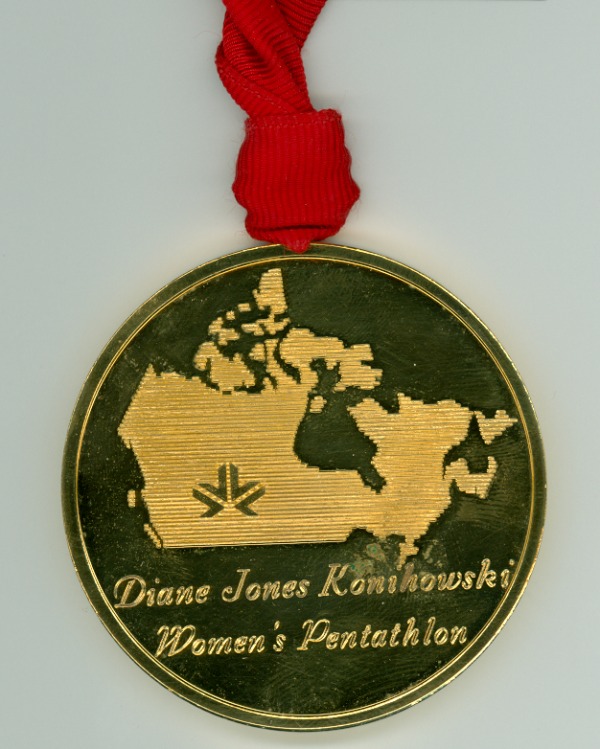 gold medal with Edmonton logo on map of Canada