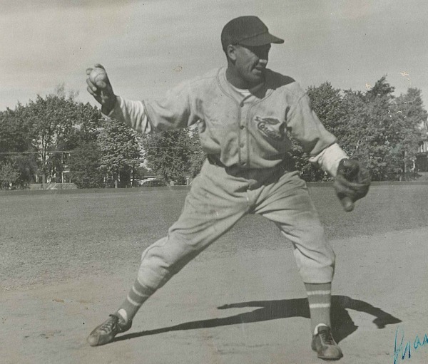 photograph of Manny McIntyre throwing baseball