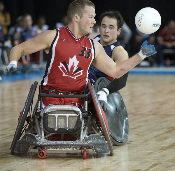 photograph of Zak Madell playing wheelchair rugby