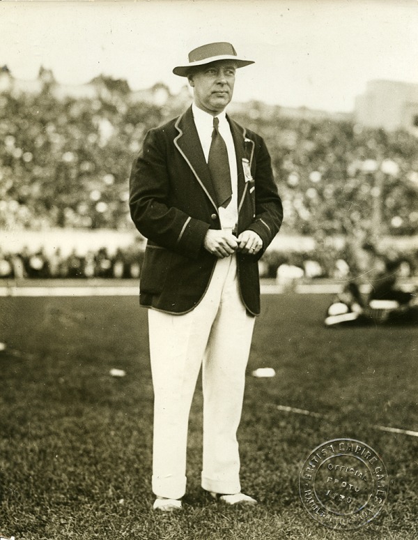 Photograph M.M. Robinson in a dark blazer and hat