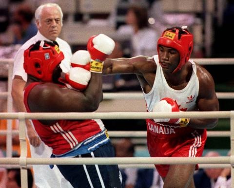 Photograph of Lennox Lewis boxing