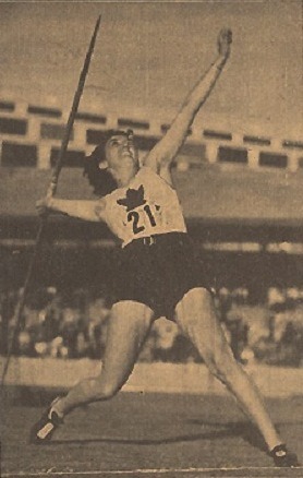 photograph of Robina Higgins throwing javelin