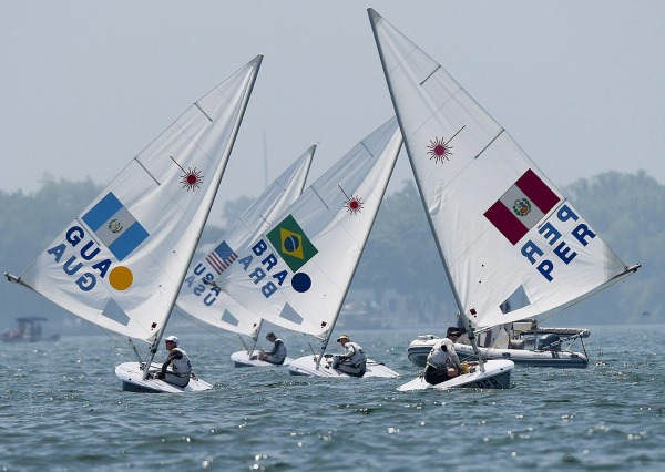 four laser sailboats in competition