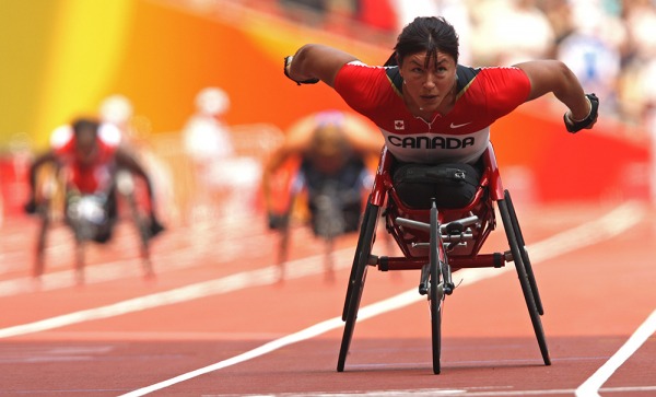 photograph of Chantal Petitclerc competing in wheelchair race