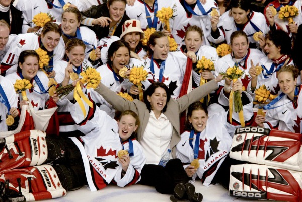 photograph of 2002 Women's Olympic Team with medals