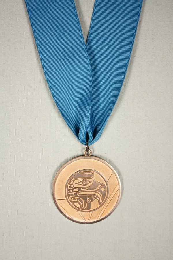 Bronze medal with image of thunderbird