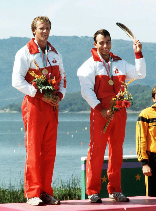 photograph of Alwyn Morris and Hugh Fisher standing on podium)