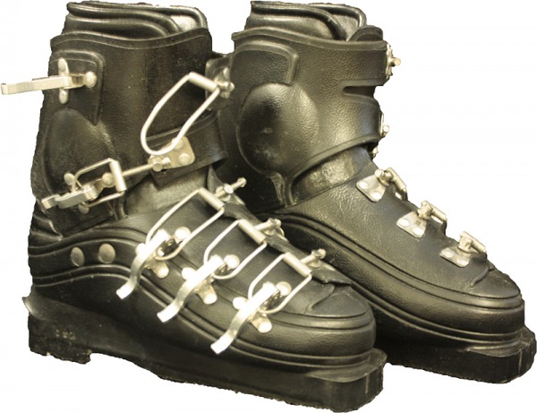 black plastic ski boots with metal clasps across instep and ankle